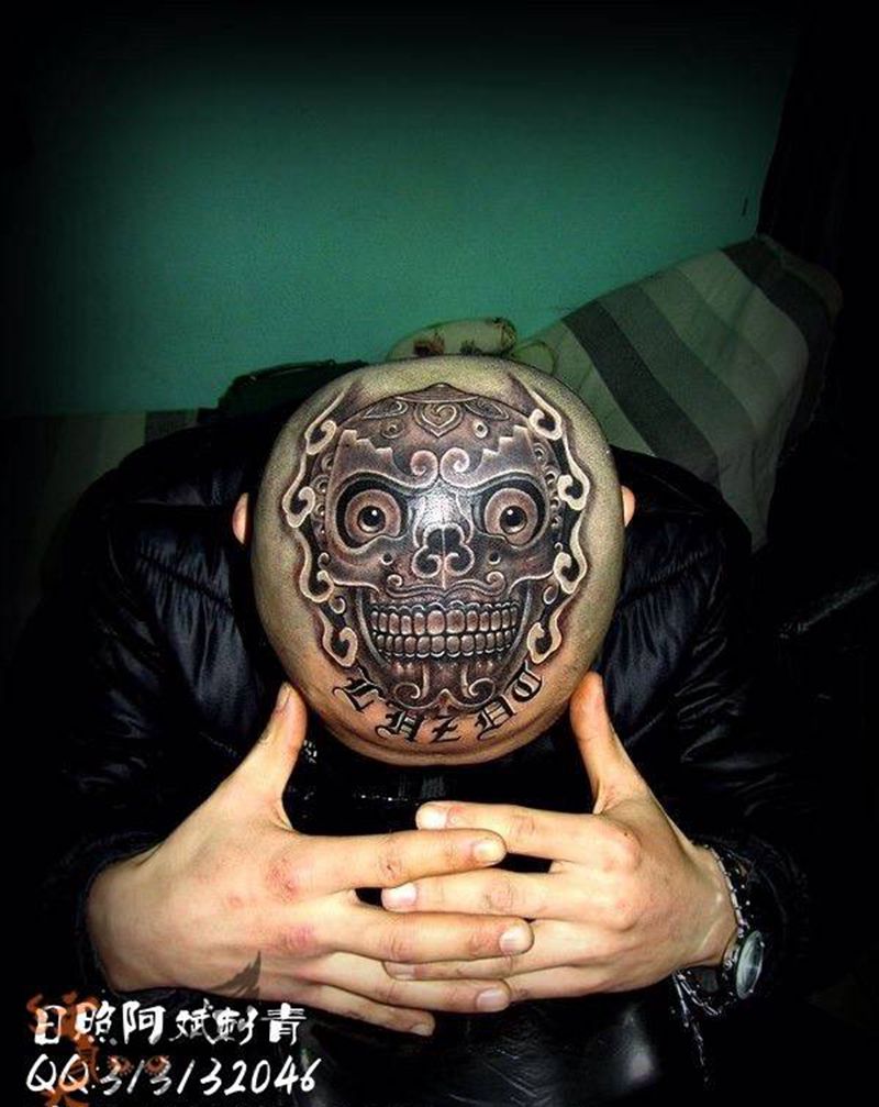 嘎巴拉纹身图片_传统鬼神头部纹身图案