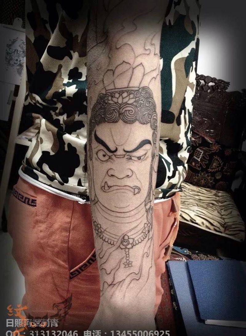 花臂 线条纹身图片_手臂传统鬼神纹身图案