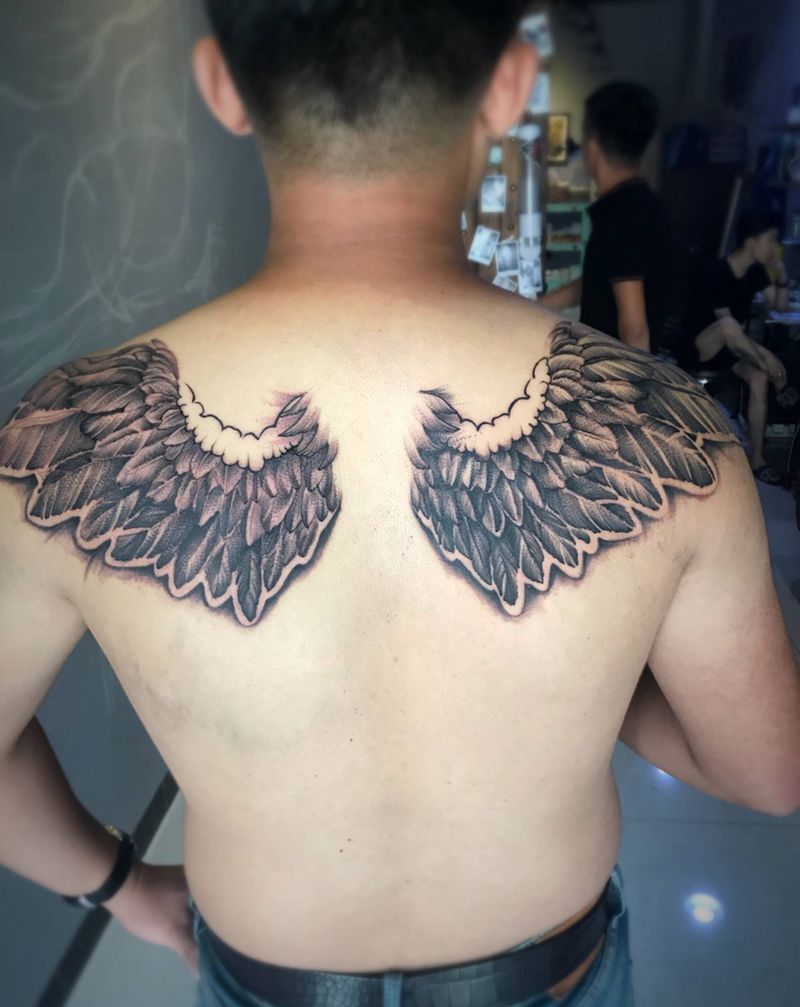 针痕 翅膀。纹身图片