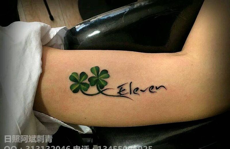 四叶草纹身图片_手臂清新字符植物成品纹身图案