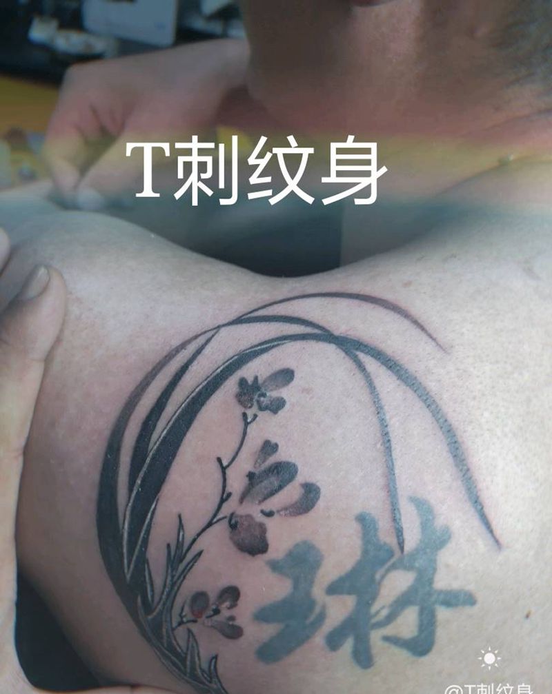 兰花纹身图片_背部老传统新传统纹身图案
