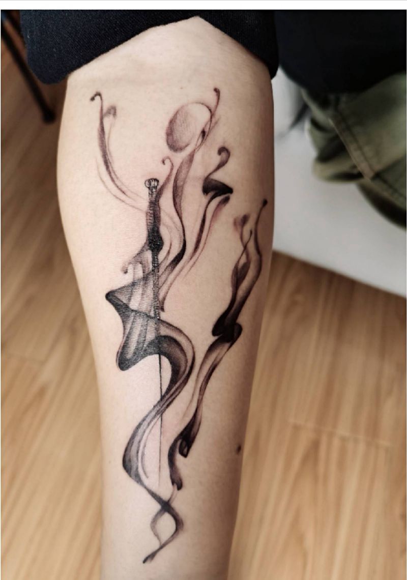 银针纹身图片_手臂水墨纹身图案