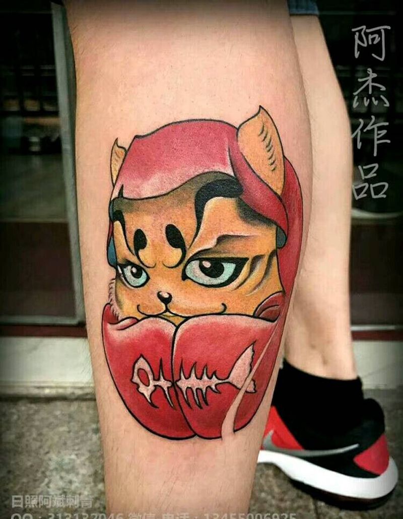 达摩不倒翁纹身图片_腿部传统鬼神成品纹身图案