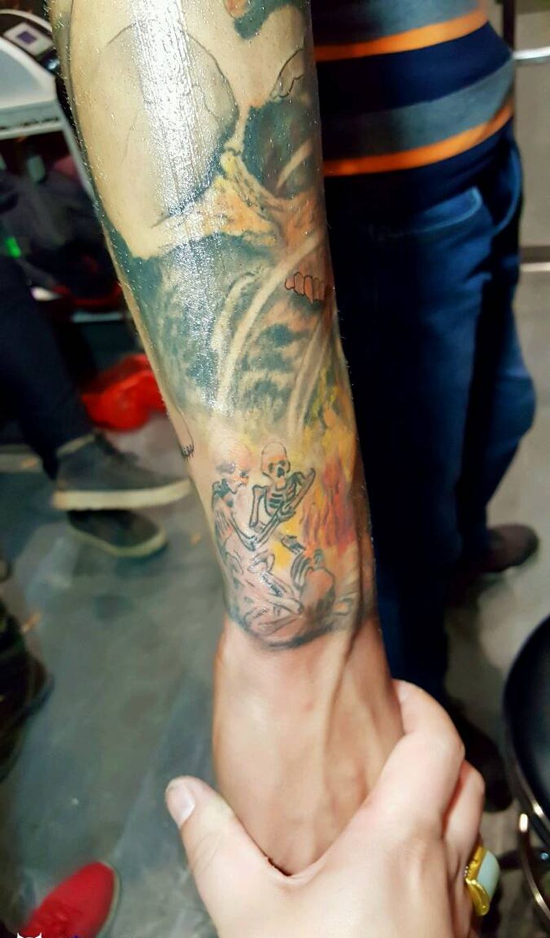 花臂纹身图片_手臂传统写实人物鬼神聊城成品纹身图案