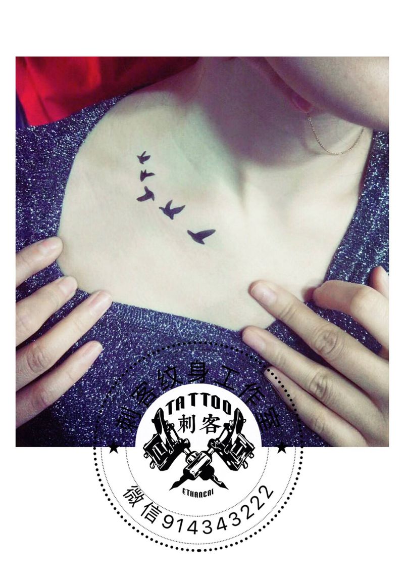 飞鸟纹身图片_颈部纹身图案