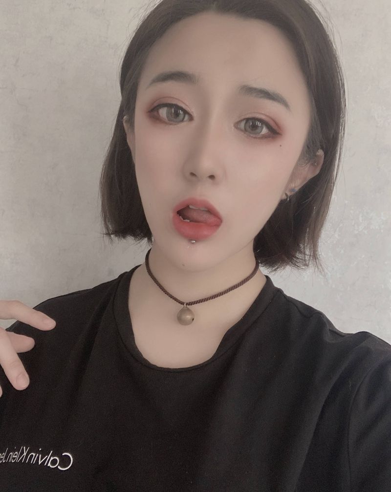 穿孔纹身图片_脸部纹身图案