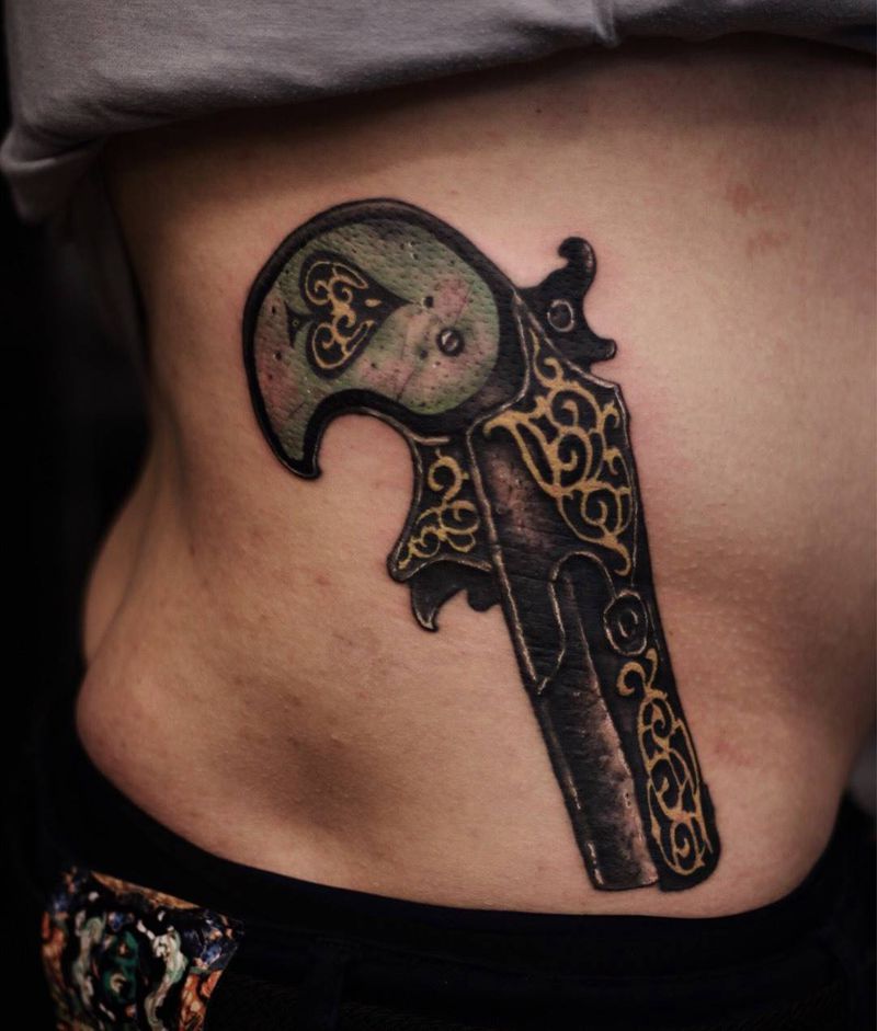 色字头上一杆枪纹身图片