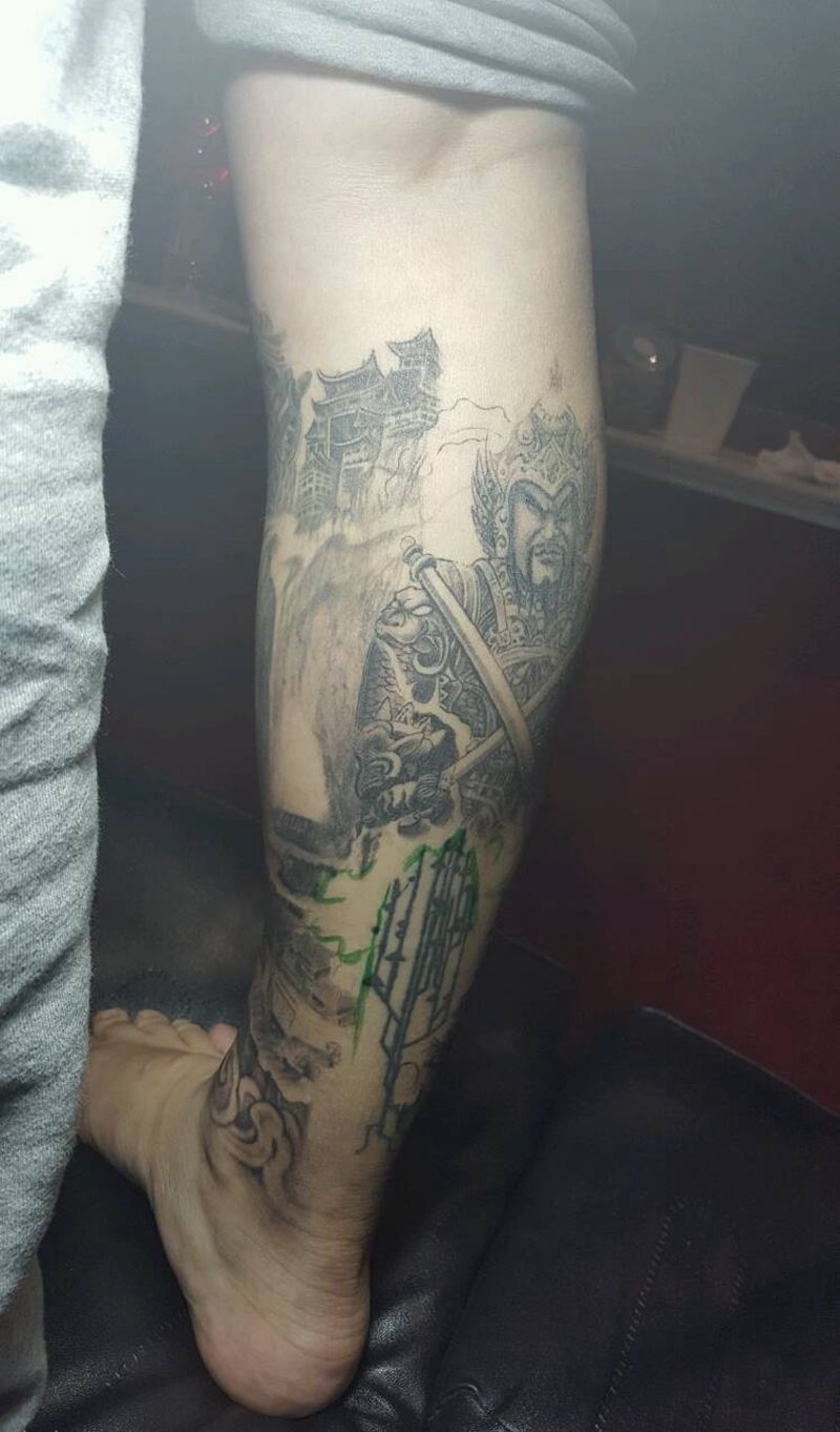 花腿纹身图片_腿部传统写实人物鬼神聊城烈火风格成品纹身图案