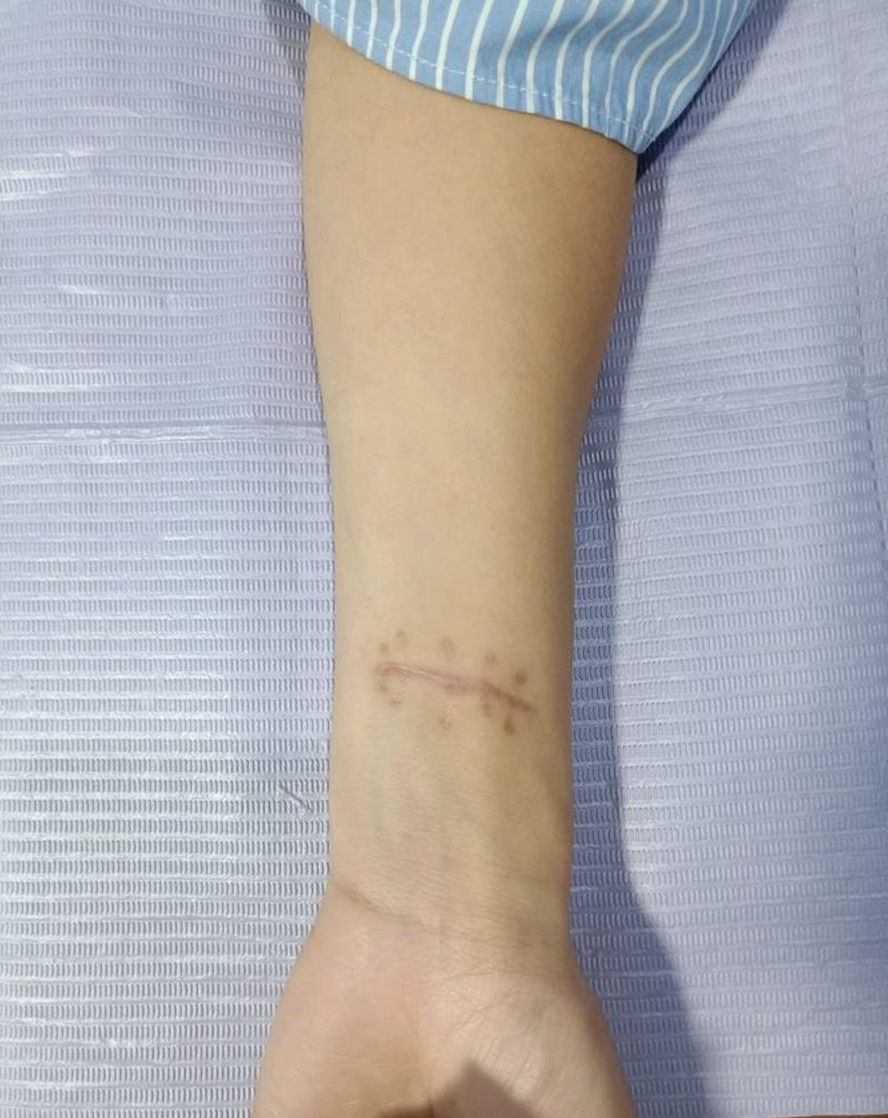 达摩蛋纹身图片_手臂纹身图案