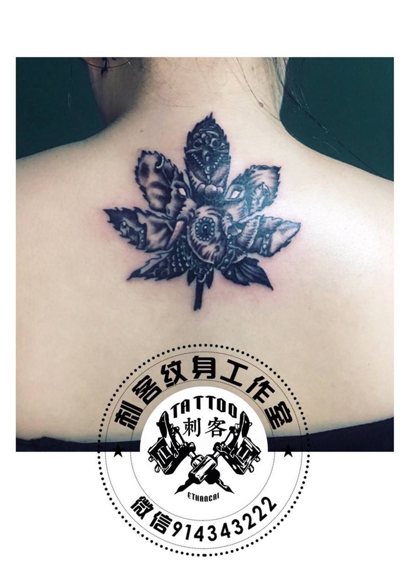 枫叶象神纹身图片