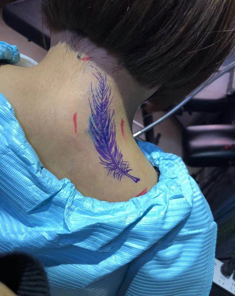 羽毛遮盖旧图纹身图片