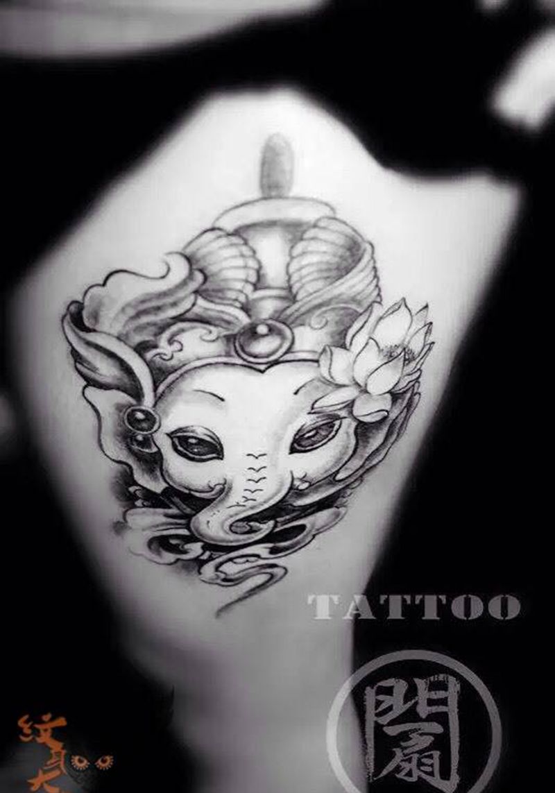 象神纹身图片_成品腿部清新传统动物宗教纹身图案