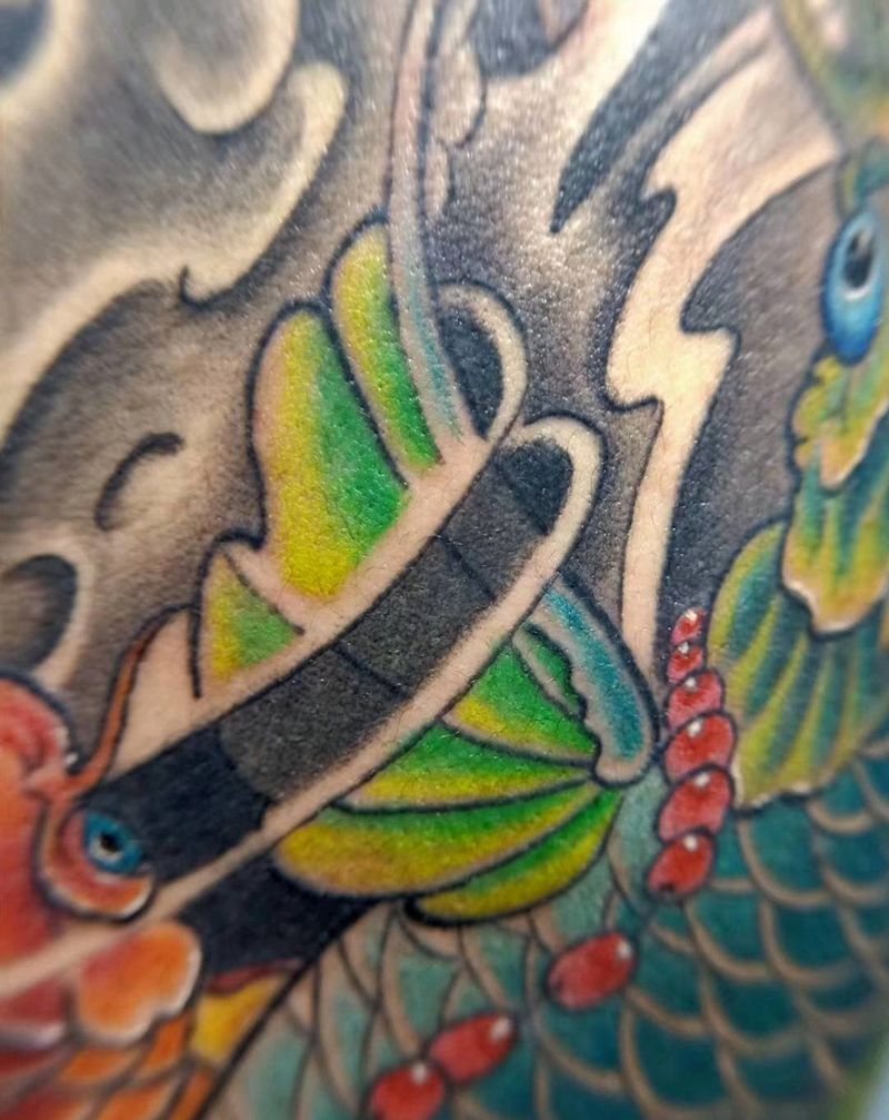 鲤鱼跃龙门纹身图片_手臂纹身图案