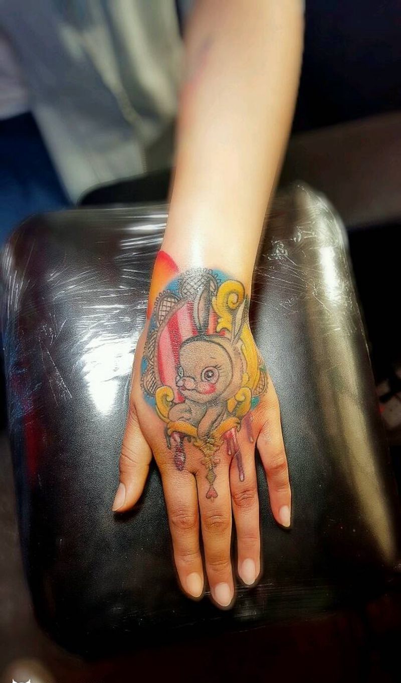 欧美小图纹身图片_手部欧美动物成品纹身图案