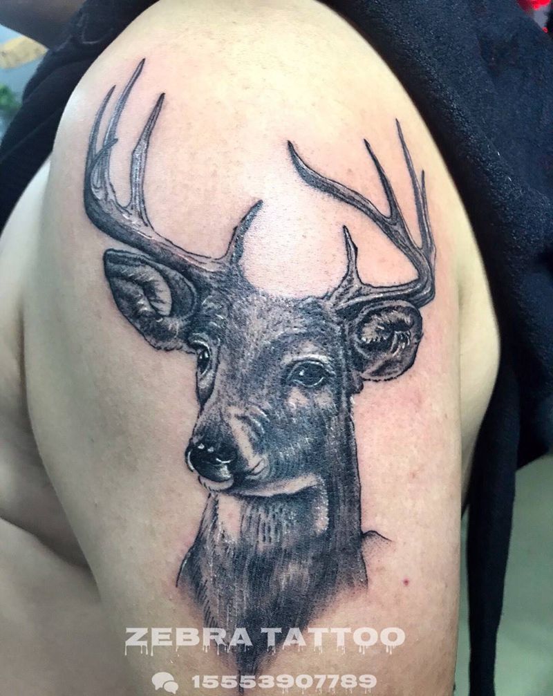 生财有鹿纹身图片