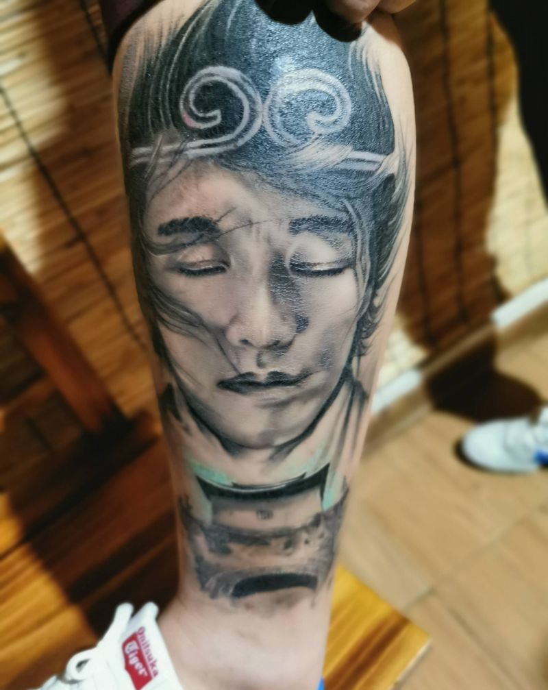 肖像纹身图片_腿部欧美写实纹身图案