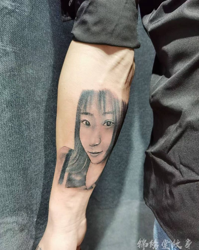 心中的姑娘纹身图片_手臂新传统纹身图案