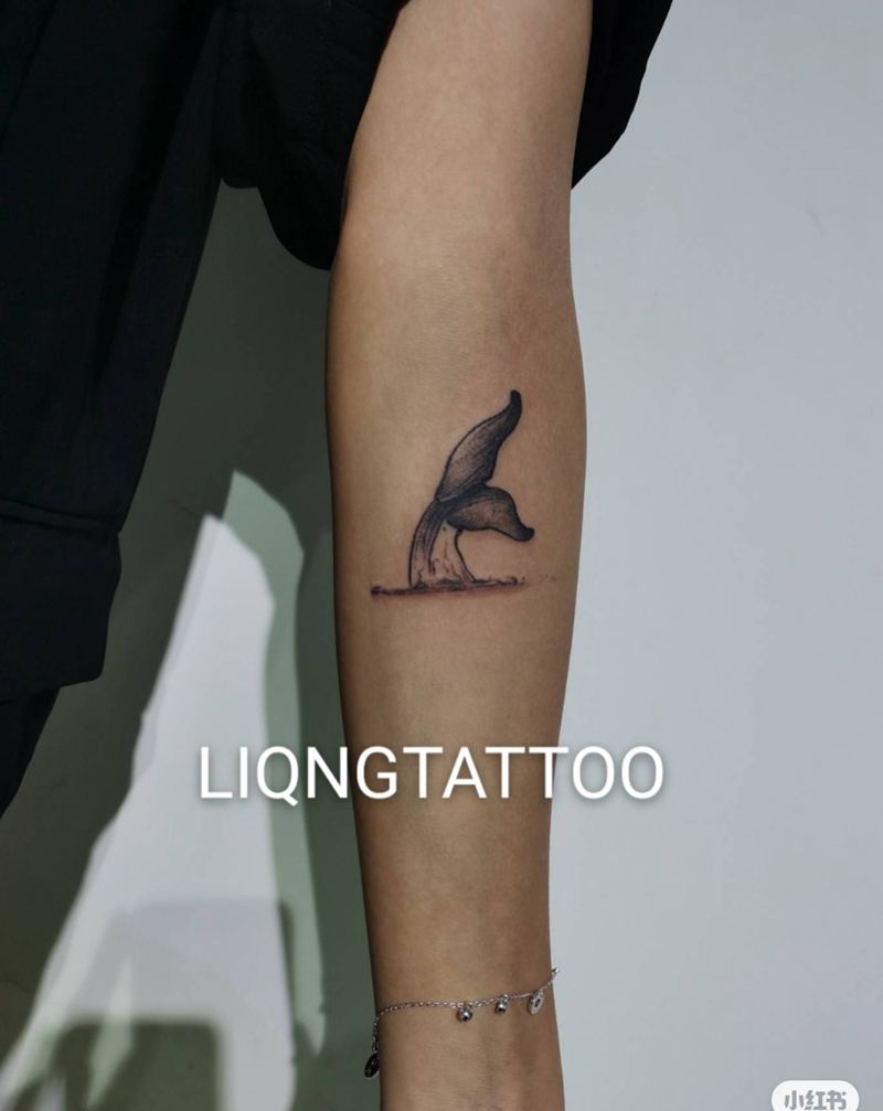 尾巴纹身图片_手臂纹身图案