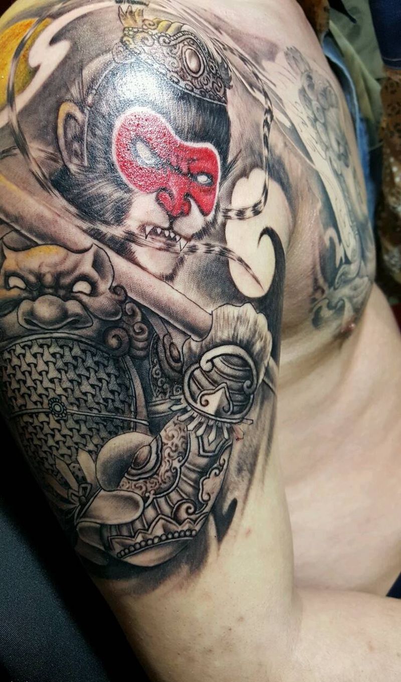 半甲斗战胜佛纹身图片_肩部胸部手臂传统人物鬼神宗教聊城烈火风格成品纹身图案