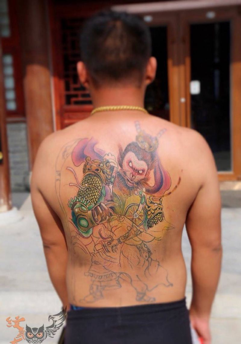 遮盖旧图纹身图片_人物鬼神宗教背部成品烈火风格纹身图案