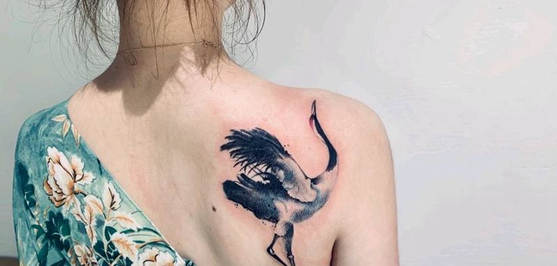 仙鹤遮盖纹身图片_背部纹身图案