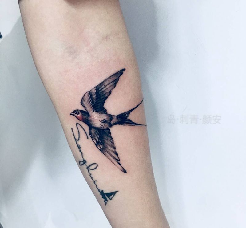 燕归来纹身图片