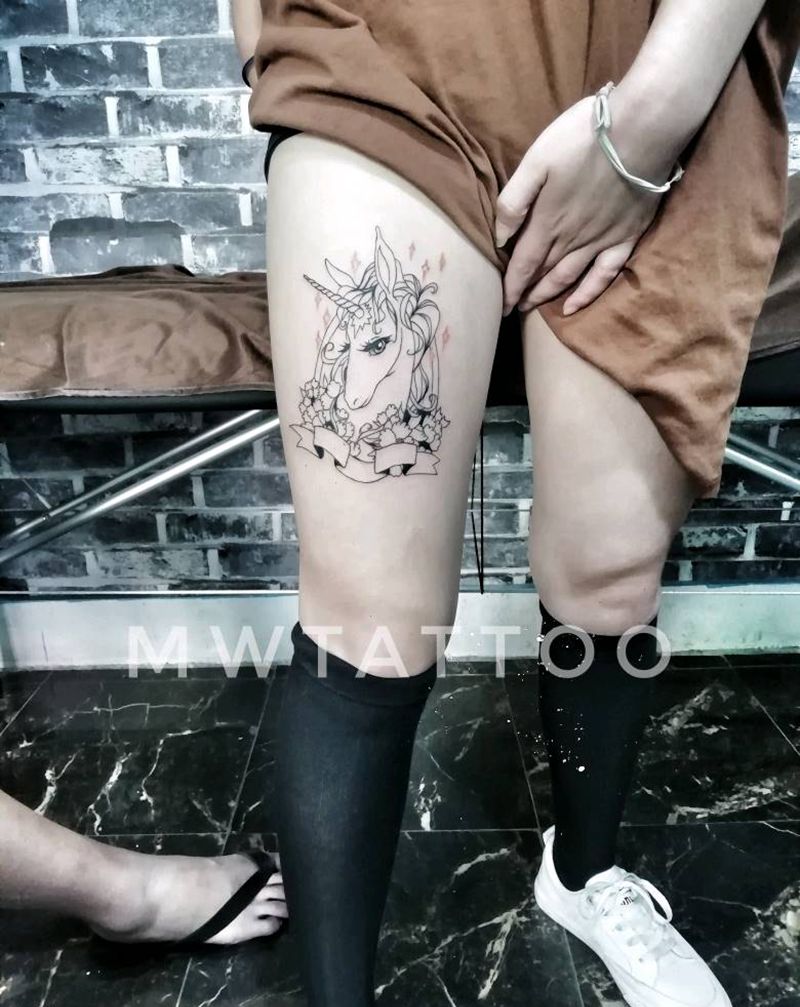 独角兽纹身图片_腿部纹身图案