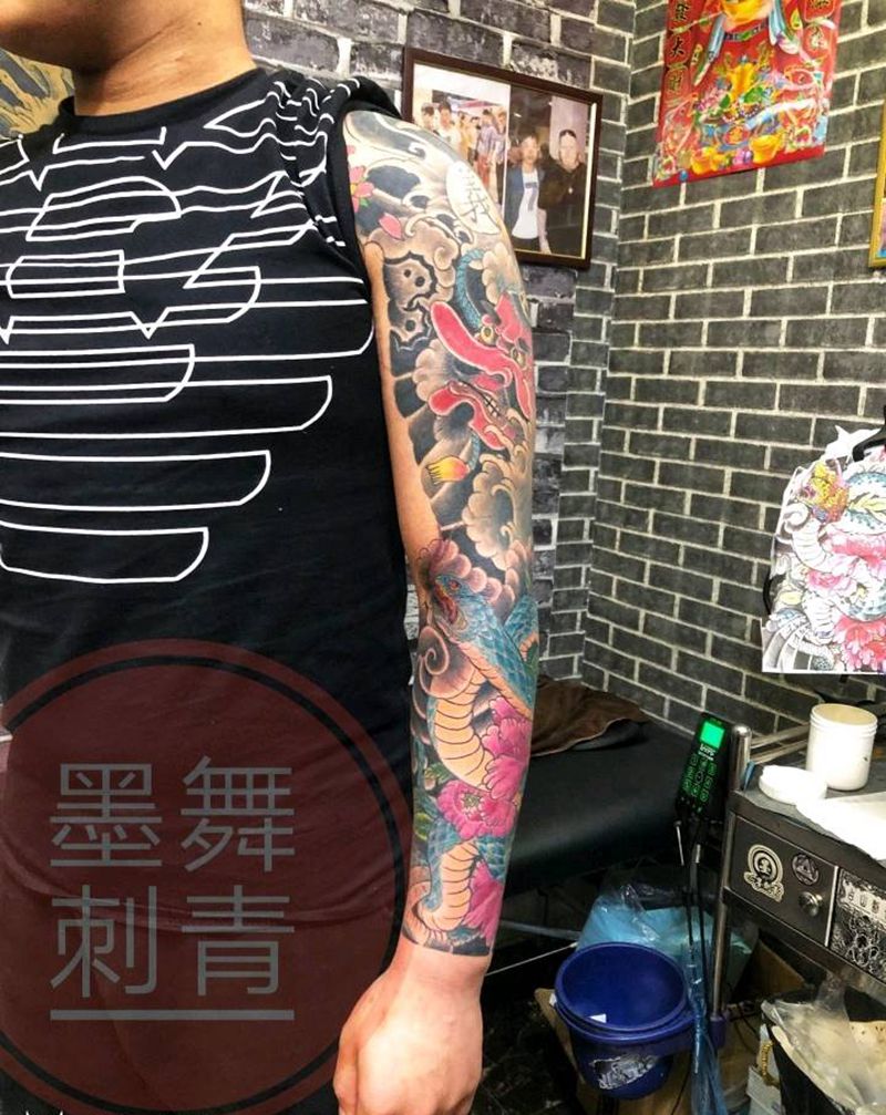 花臂纹身图片_手臂老传统纹身图案