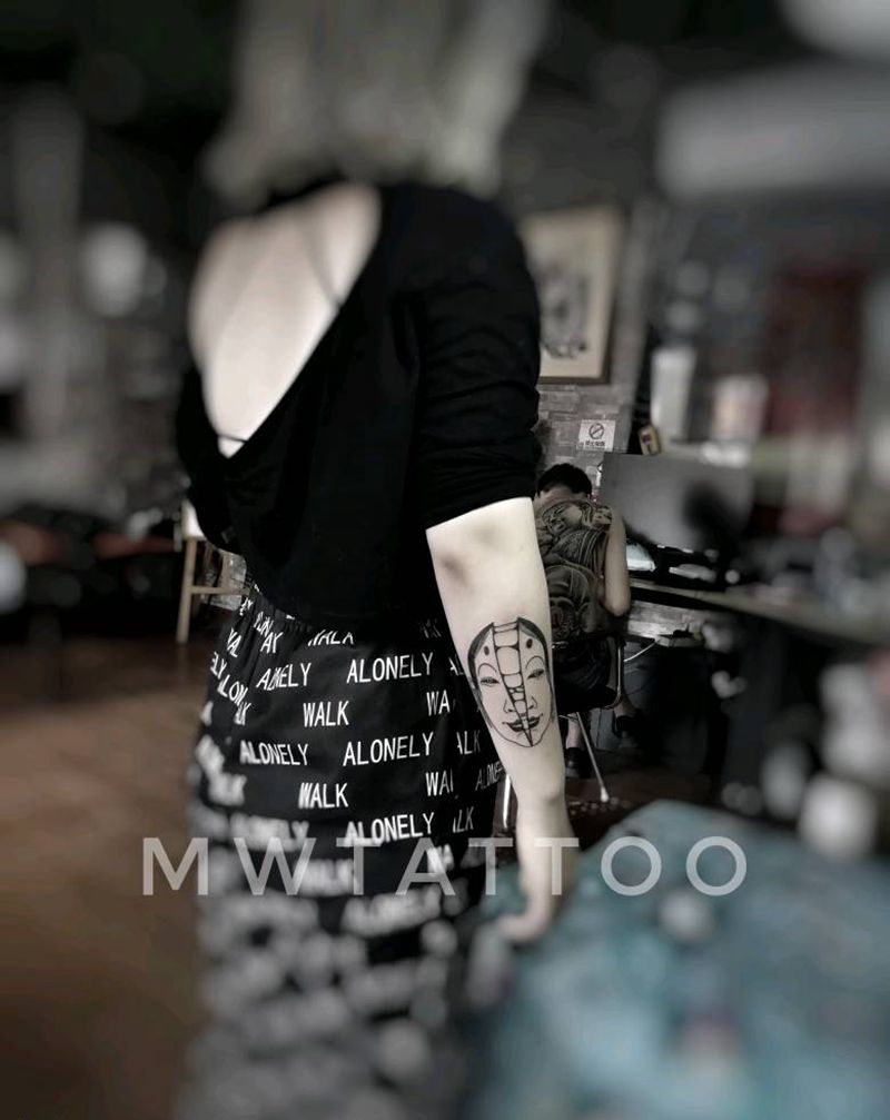 小面具纹身图片