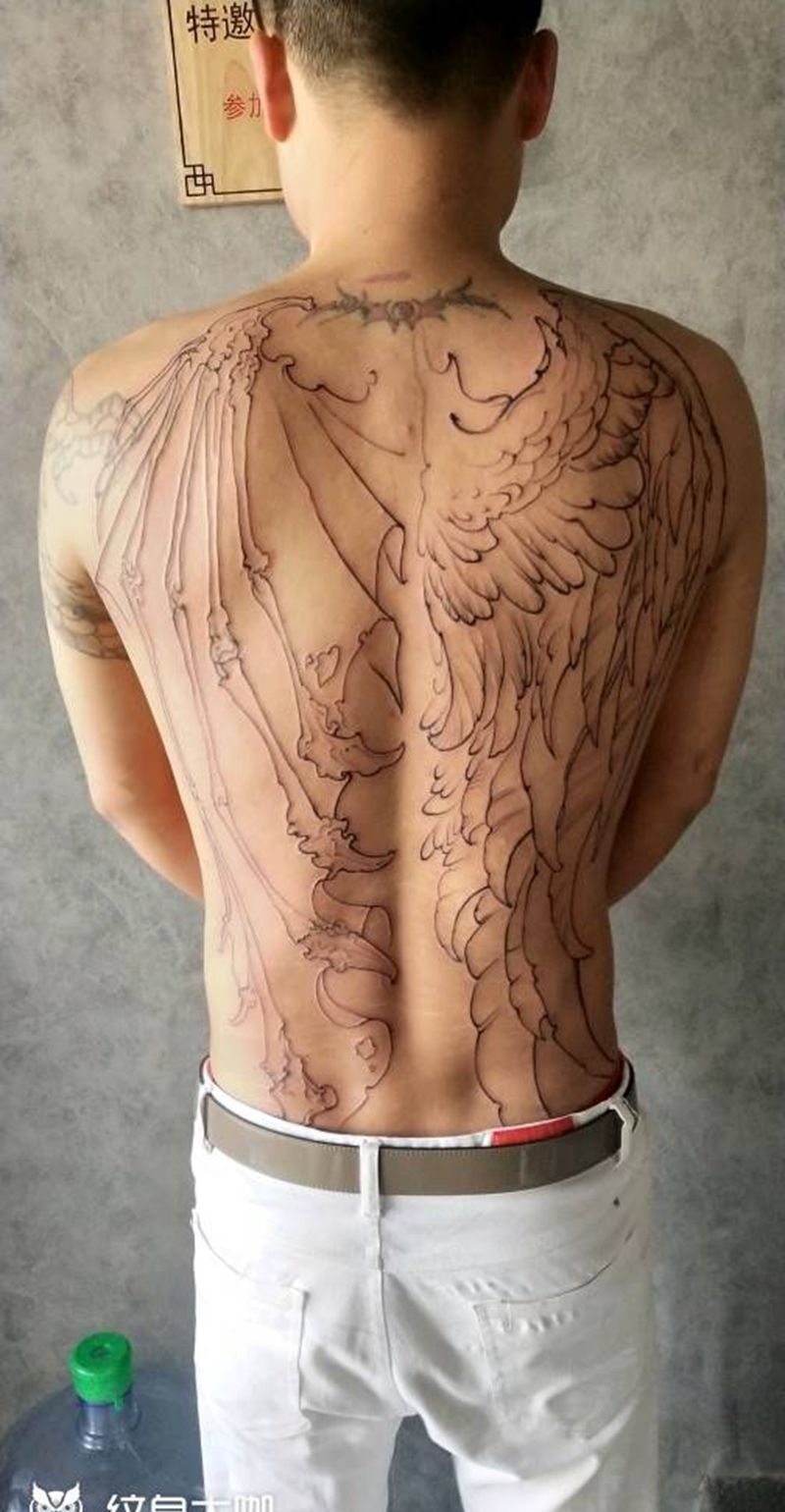 翅膀未完成纹身图片