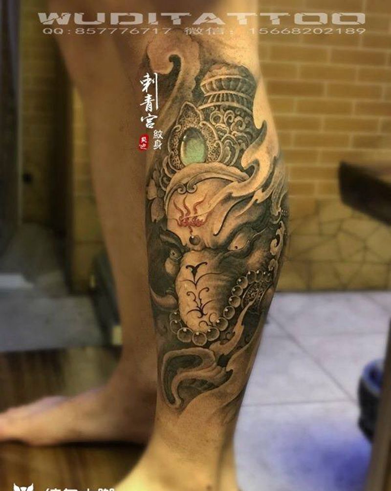 小腿象神纹身图片