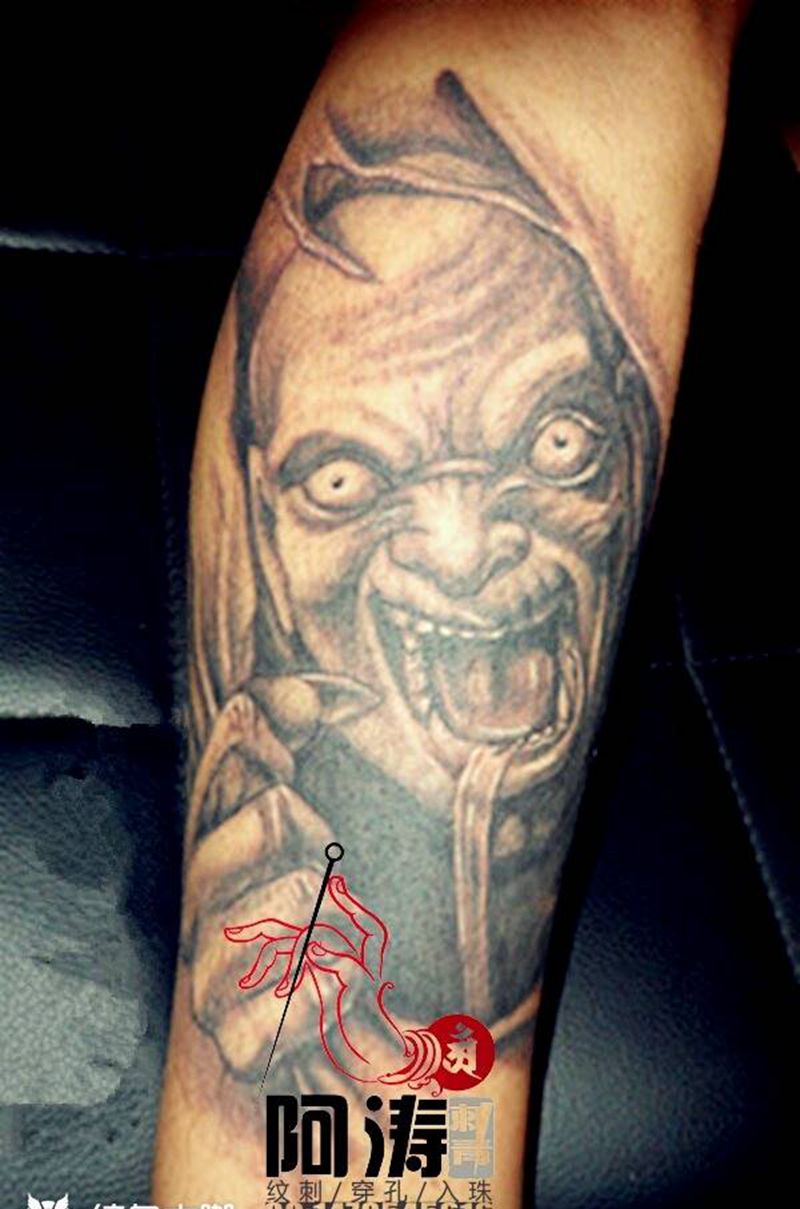 心魔成真纹身图片_腿部传统鬼神纹身图案