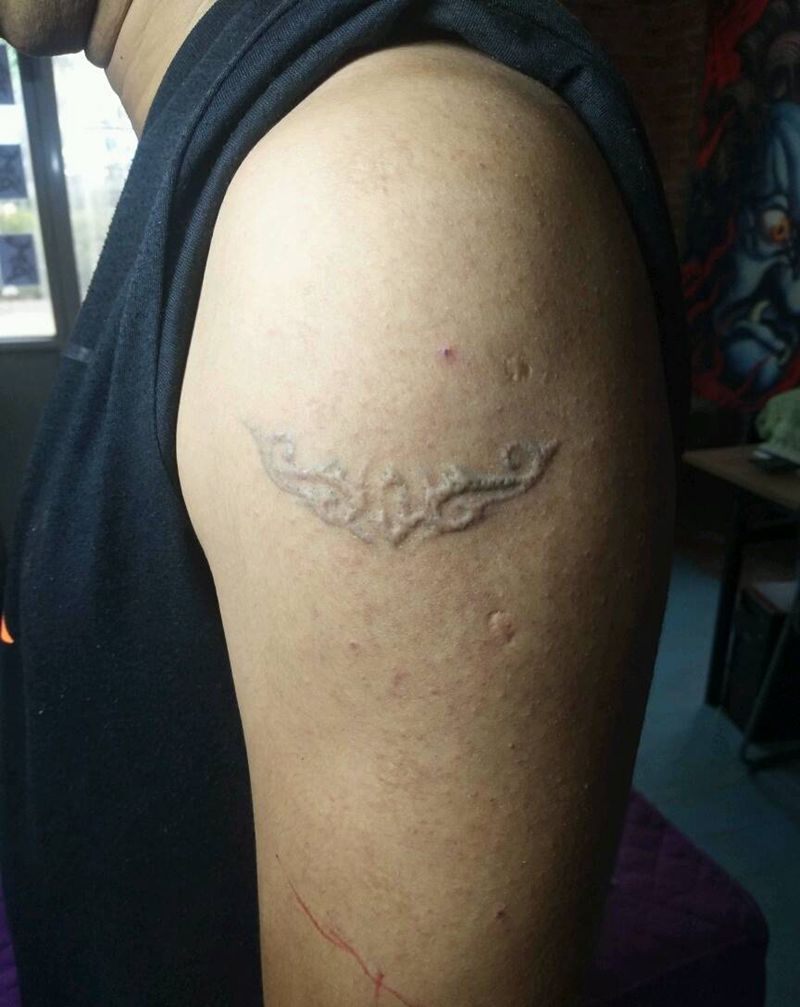 佛，未完成的样子纹身图片_肩部手臂新传统纹身图案