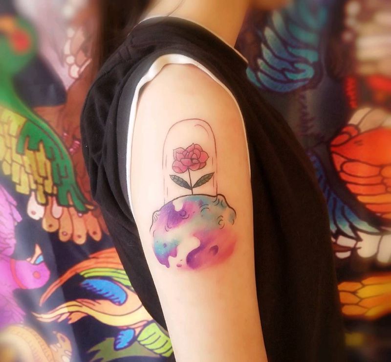 宇宙的花纹身图片