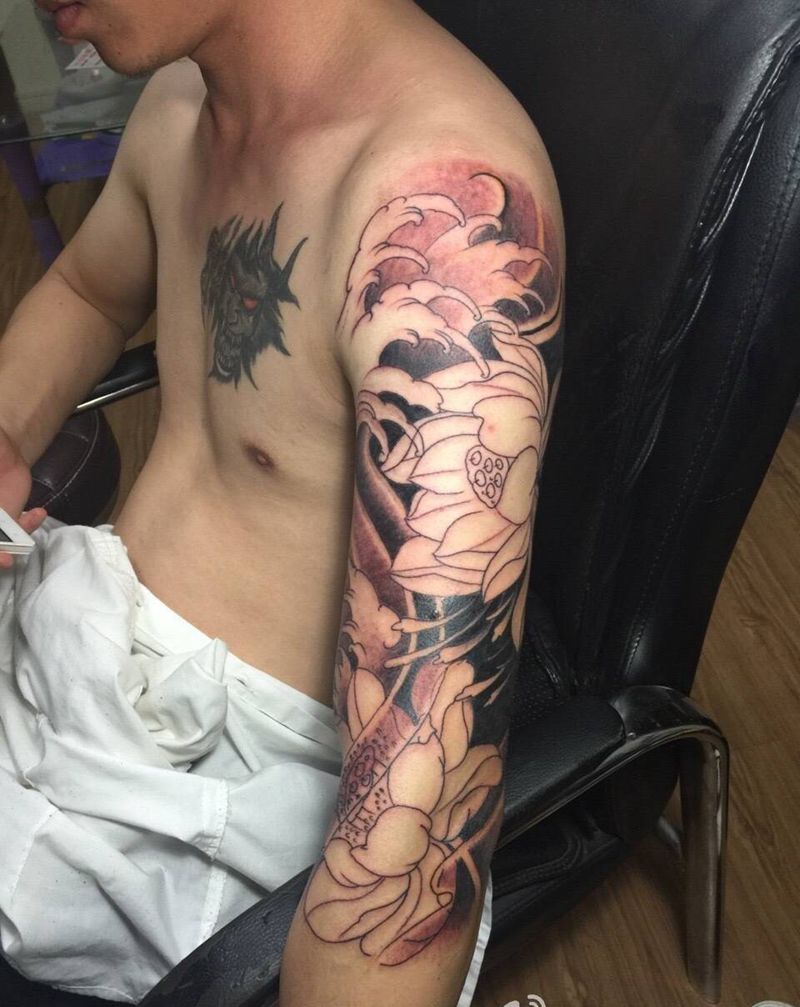 花臂纹身图片_成品手臂传统植物郑州纹身图案