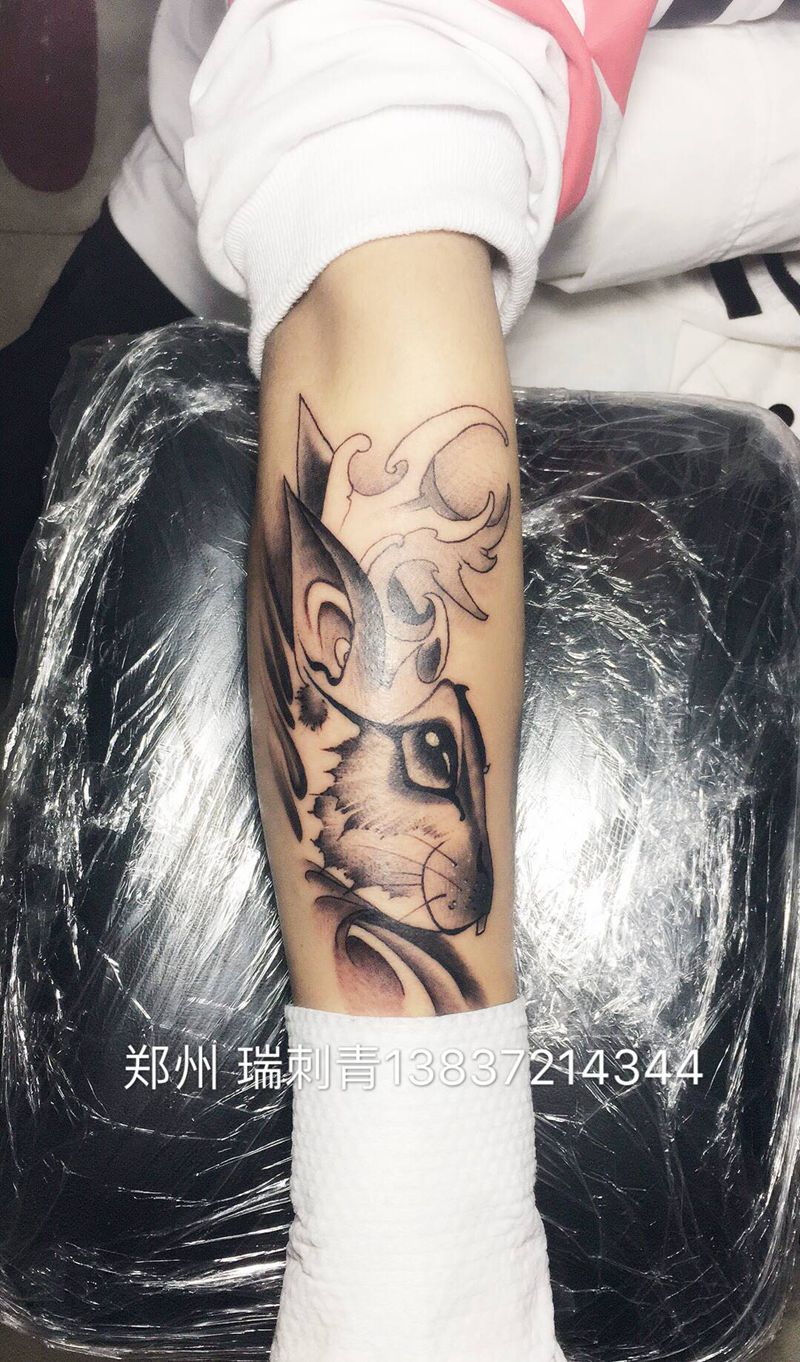 欧美兔子纹身图片_手臂纹身图案