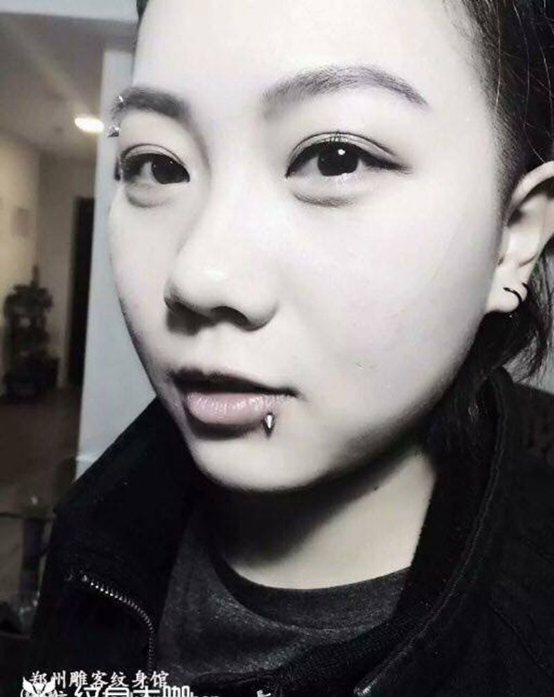 人体穿孔纹身图片_成品人体穿孔郑州纹身图案