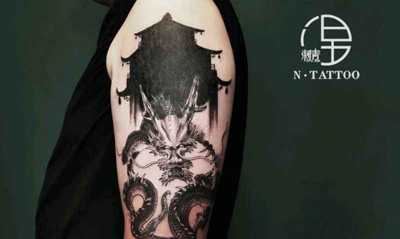 遮盖龙纹身图片_手臂新传统纹身图案