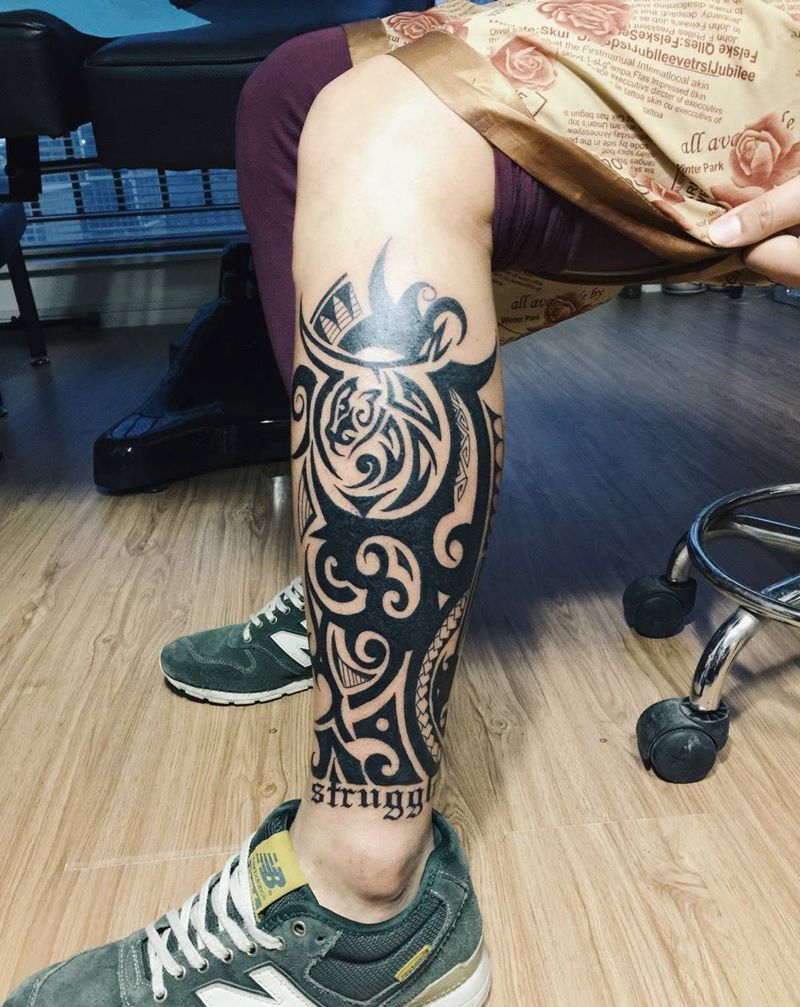 图腾纹身图片_成品腿部传统图腾郑州纹身图案