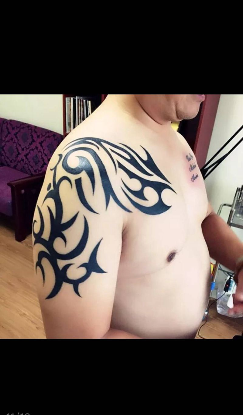 图腾纹身图片_成品手臂胸部传统图腾郑州纹身图案