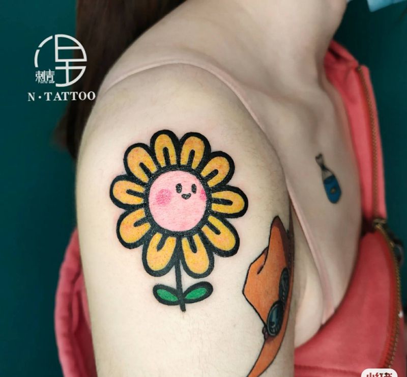 卡通向阳花纹身图片_手臂纹身图案