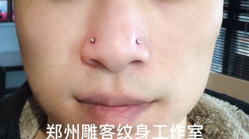 人体穿孔纹身图片_成品人体穿孔郑州培训纹身图案