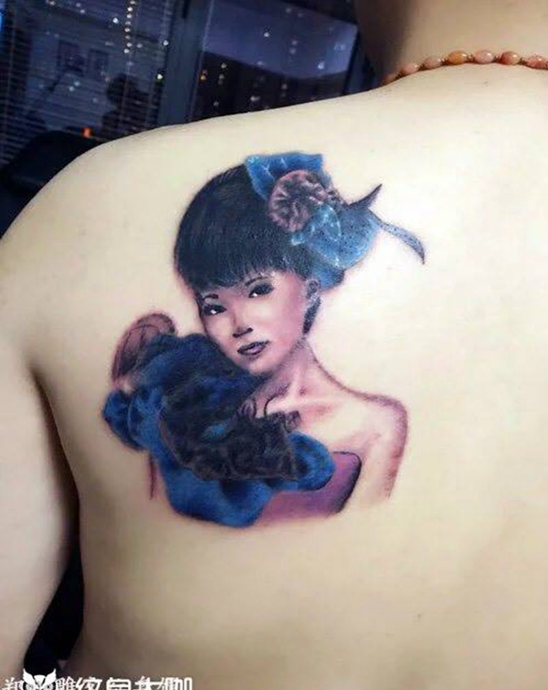人物肖像纹身图片_成品背部肖像人物郑州纹身图案