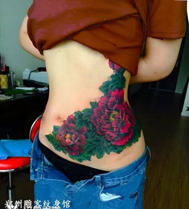 遮盖壬辰纹纹身图片_成品腹部传统植物郑州纹身图案