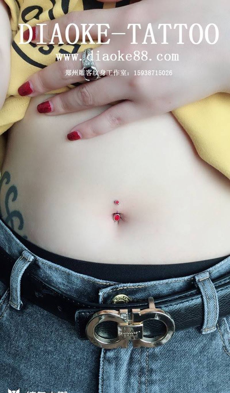脐环纹身图片_成品腹部人体穿孔郑州培训纹身图案