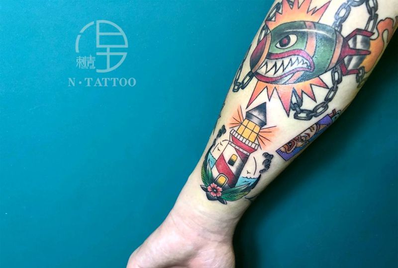 鱼雷灯塔纹身图片_手臂Old School纹身图案