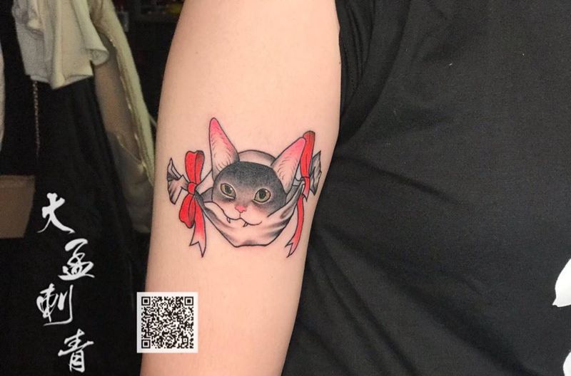 猫咪纹身图片_手臂纹身图案
