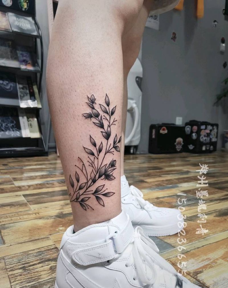 素花纹身图片_腿部纹身图案