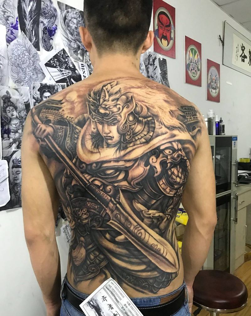 战神子龙纹身图片