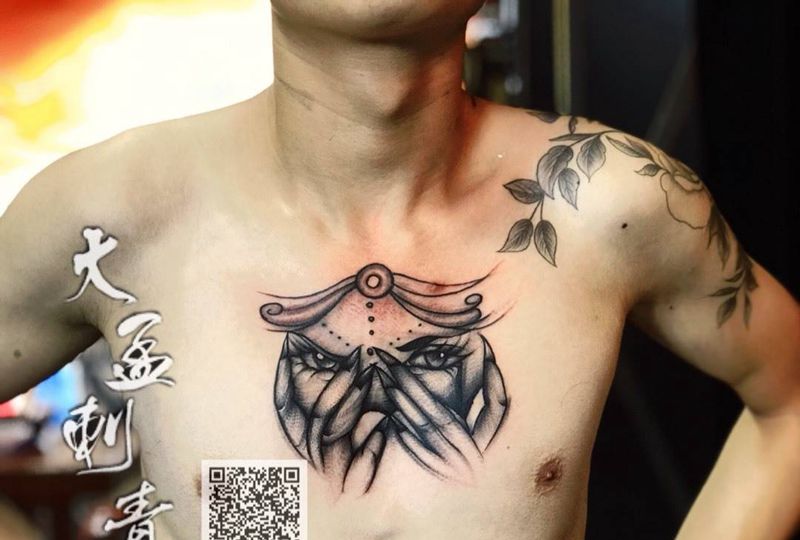 看图案猜名字纹身图片_胸部纹身图案